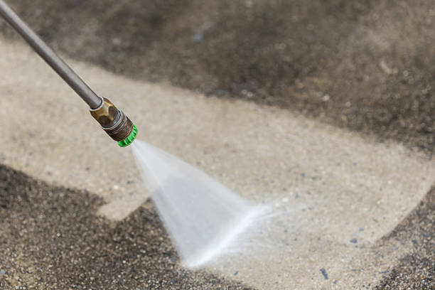 istock Outdoor floor cleaning with high pressure water jet 466976682