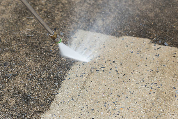 istock Outdoor floor cleaning with high pressure water jet 466976684