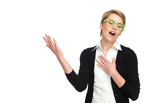 istock Young blond woman singing. 466977737
