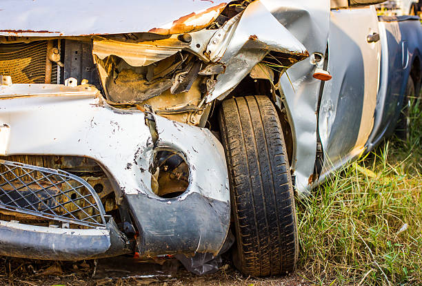 istock Old damaged rusty car wreck  in the grass 466978824