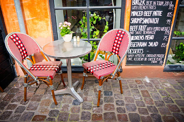 Vintage old fashioned cafe chairs with table in Copenhagen, Denm
