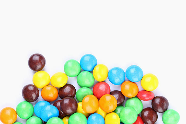 istock Chocolate balls in colorful glaze are bottom. 466980451