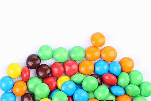 istock Chocolate balls in colorful glaze are bottom. 466980455