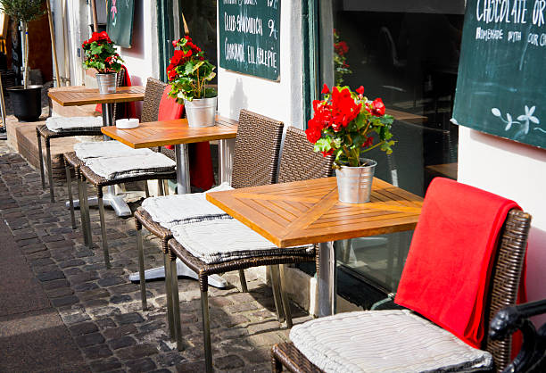 istock Vintage old fashioned cafe chairs with table in Copenhagen, Denm 466980969