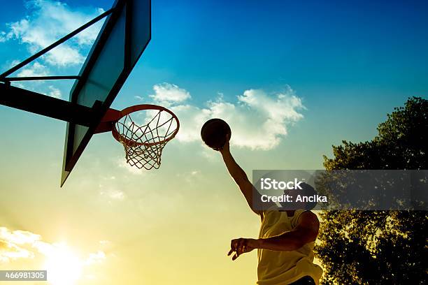 Basketball Player Silhouette At Sunset Stock Photo - Download Image Now - Basketball - Sport, Slam Dunk, Achievement