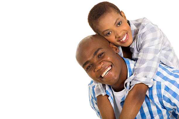 istock young black couple piggybacking 466982018