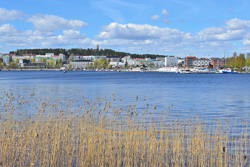 Finland. View of the city of Jyvaskyla from the lake in a sunny spring day