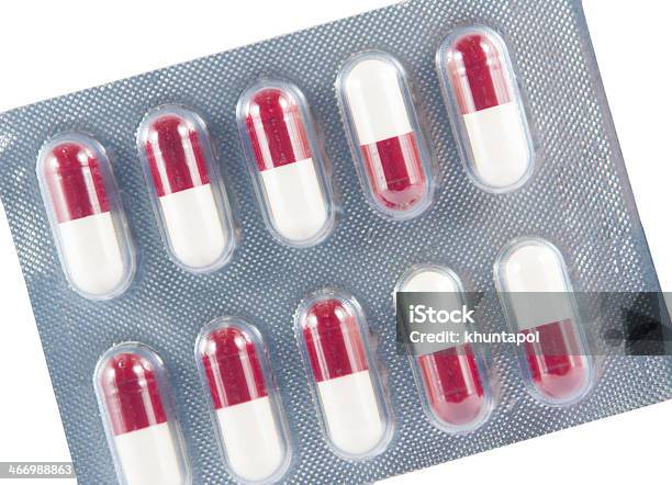 Closed Up Brown And White Capsule In Transparent Blister Pack Stock Photo - Download Image Now