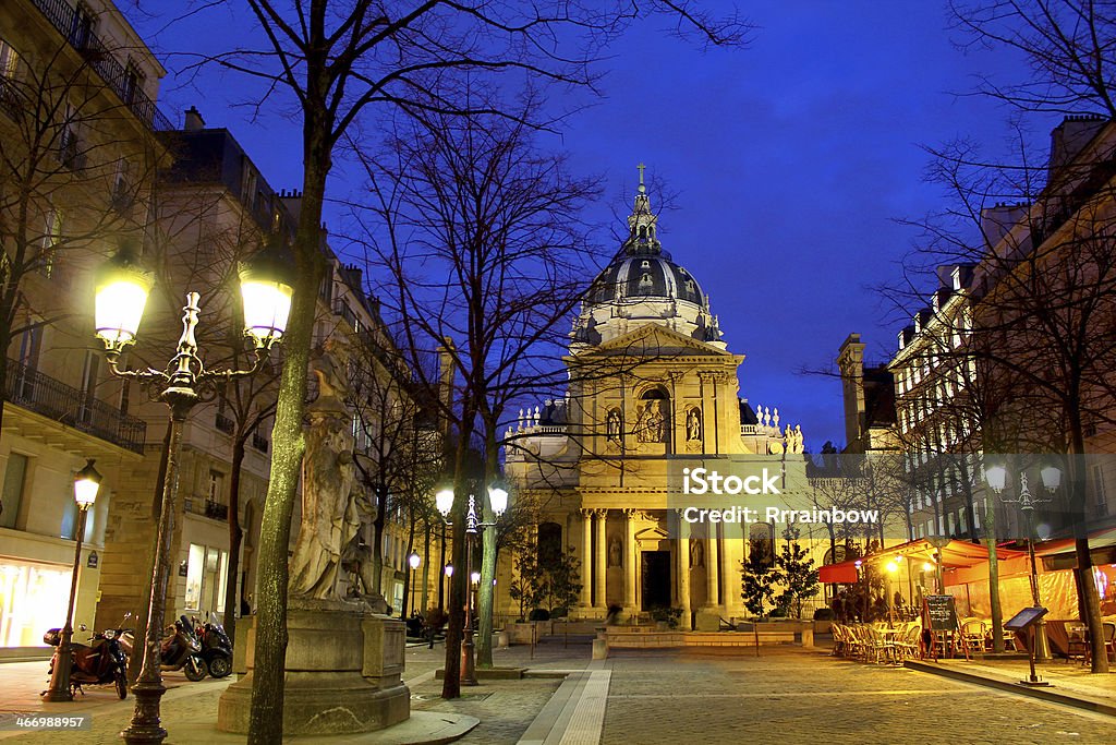 Sorbonne university by night, Paris France One of the most famous european universities with it's surrounding buildings, cafés and stores in Paris, France University of Paris Stock Photo