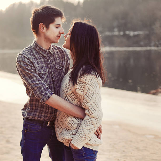 istock Young couple near the river 466989545