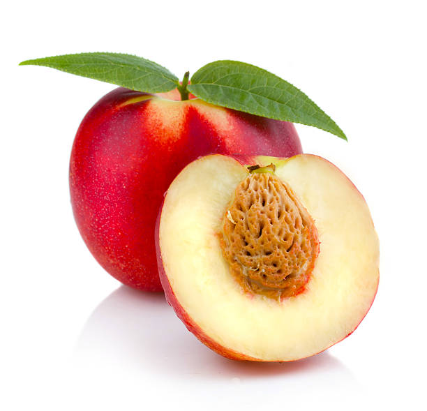 istock Ripe peach (nectarine) fruit with slices isolated on white 466995023