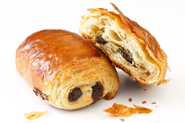 istock Chocolate croissant stacked with one half eaten 466996499