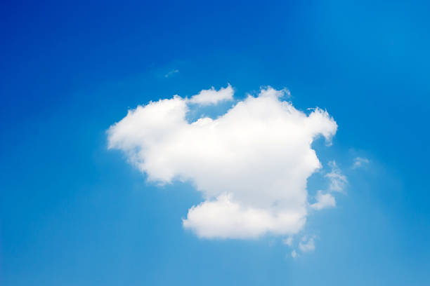 Blue sky with clouds ; like a cute rabbit stock photo