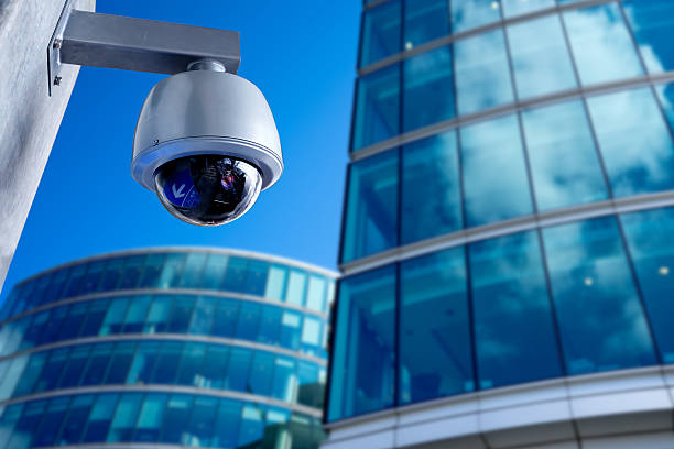 istock Exterior security camera in front of modern buildings 466997264