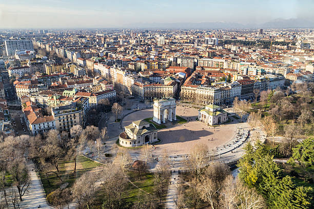 An overview of the city of Milan in Italy Panoramic  view of Milan (Italy). Sempione Square and Arco della Pace. Partial view of Sempione Park. milan stock pictures, royalty-free photos & images