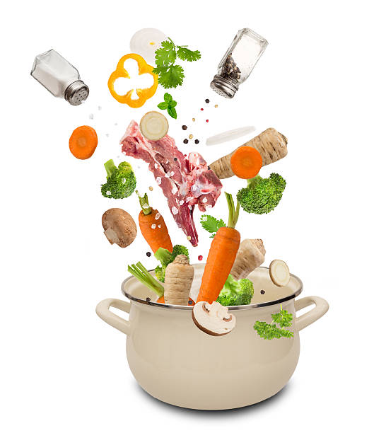 istock Fresh vegetables falling into stainless steel pot 466998050
