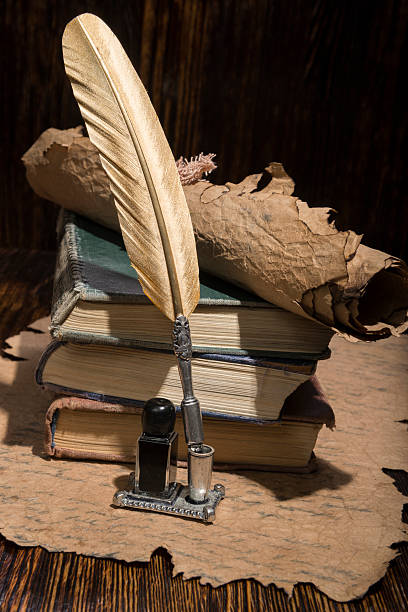 istock Vintage golden pen and ancient manuscripts 466998466