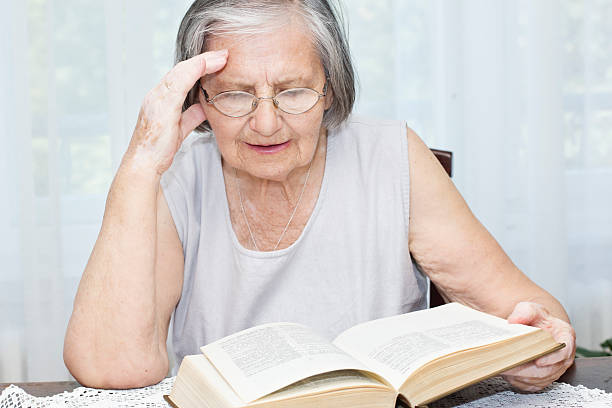 istock Senior woman reading 466999383