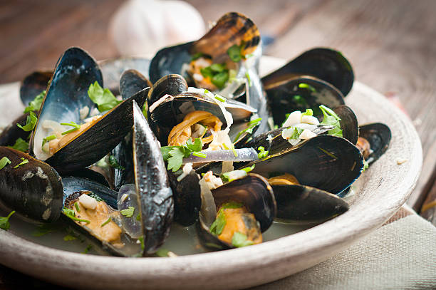 istock Moules Marinieres - Mussels cooked with white wine sauce 466999722
