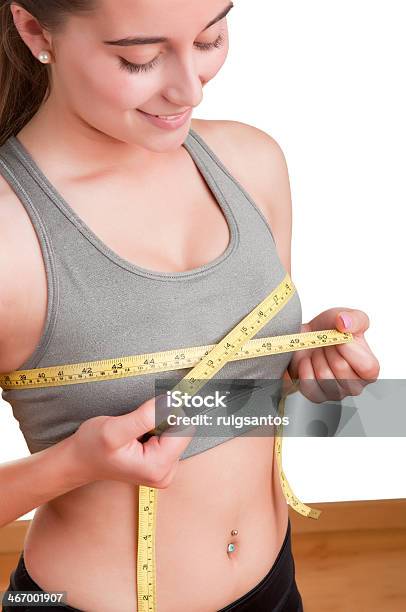 Woman Measuring Up Her Chest Stock Photo - Download Image Now - Adult, Beautiful People, Beauty