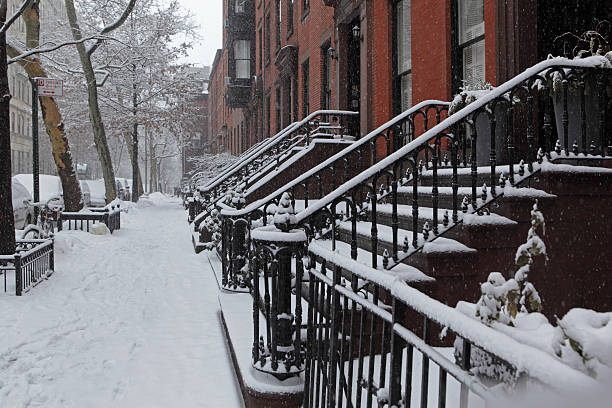 istock Snow covered Brooklyn brownstone townhouse stoops and sidewalk 467002006
