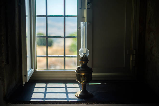 istock Traditional oil lamp on window sill 467003887