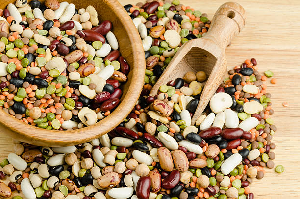 istock legumes on wood, closeup, background 467004154