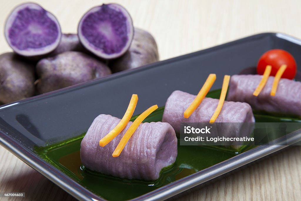 Potato dumplings with red wine Meal Stock Photo