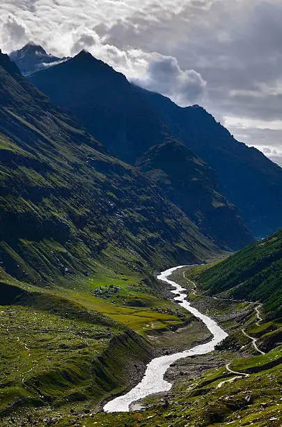 Mountains river in Lahaul valley in the Indian state of Himachal Pradesh, and the high altitude Manali-Leh road in Indian Himalayas