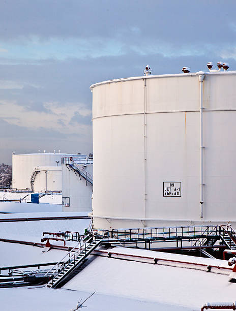 istock white tanks in tank farm with snow 467004803