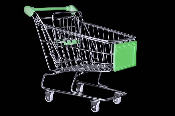 Green Shopping Cart Isolated On Black
