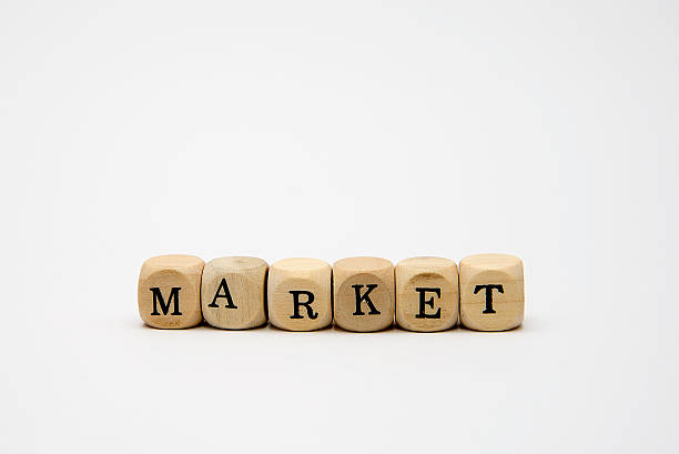 istock Market - word with dice on white background 467006166