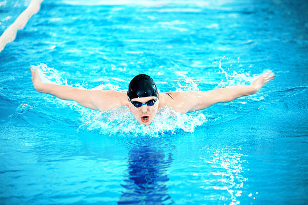 istock Young man in swimming pool 467006442