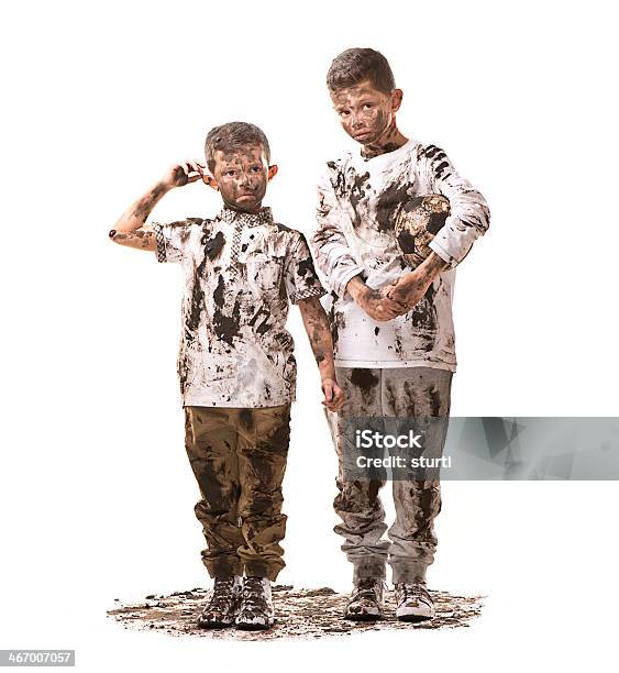 Double Trouble Stock Photo - Download Image Now - Dirty, Child, Mud