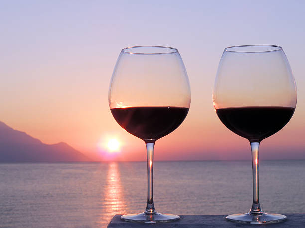 istock Sunrise On The Beach With Two Glasses Red Wine 467009512