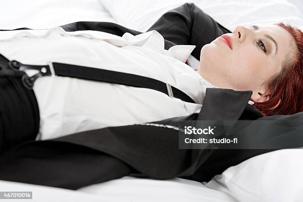 Business Woman Resting On Bed Stock Photo - Download Image Now - 2015, Adult, Beautiful People