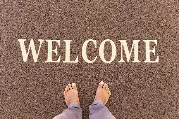 istock The new doormat of welcome text 467012364