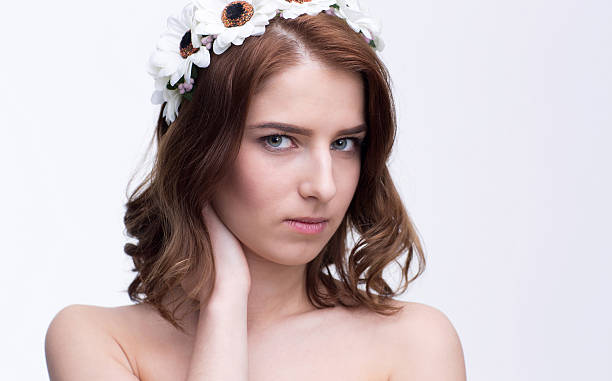 istock Beautiful young woman with wreath 467012378