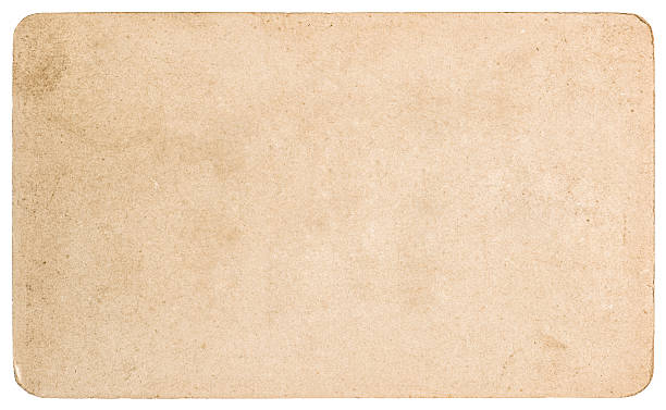 istock Used textured paper cardboard isolated. Scrapbook object 467012684