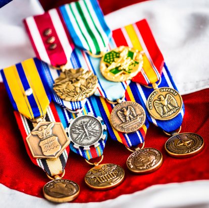 US mIlitary medals on American flag