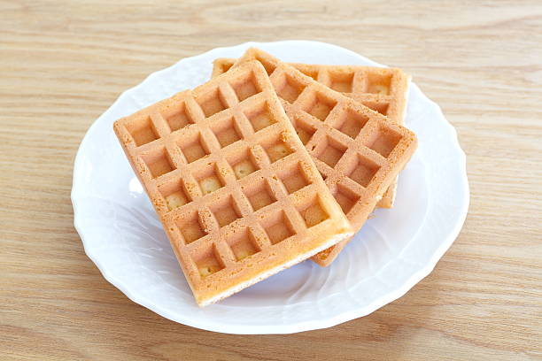 istock Delicious sweet waffle in ceramic plate on white plate 467015224