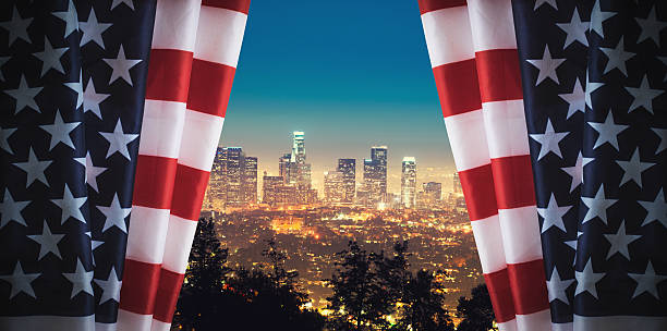 istock Us flag on the Los Angeles skyline 467015971