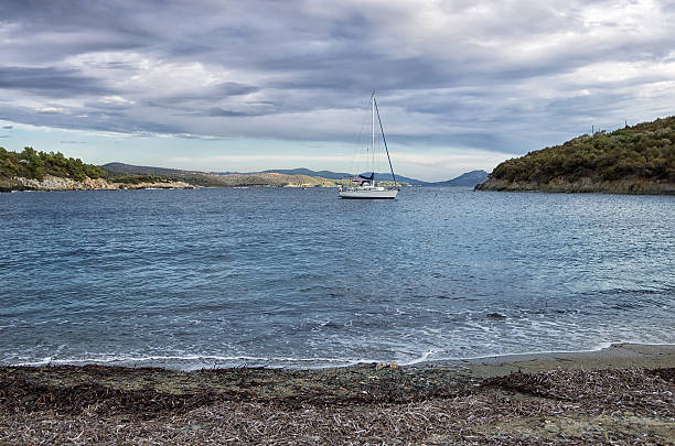 istock Sailing yacht under a cloudy sky, in Sithonia, Chalkidiki, Greece 467020343