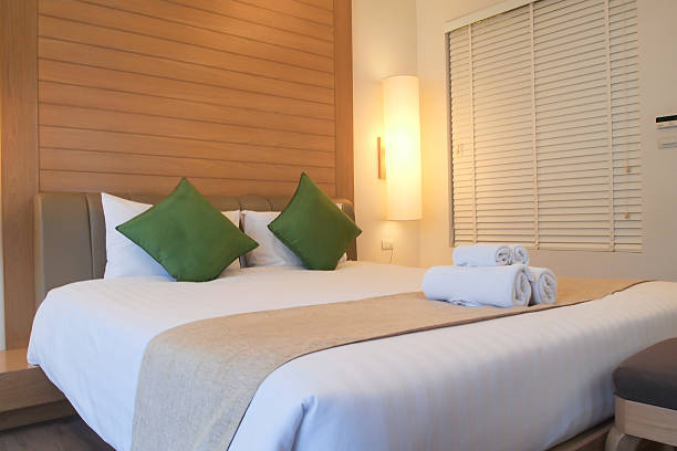 istock Closed up bed in luxury hotel room 467028220