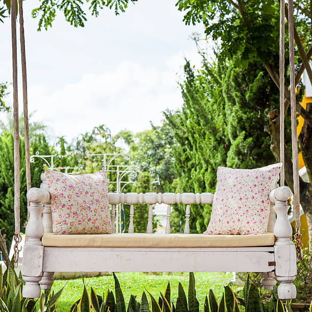istock vintage swing and light pink flower pillow 467029704