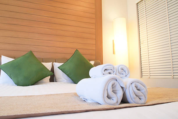 istock Bed in luxury hotel room 467029842