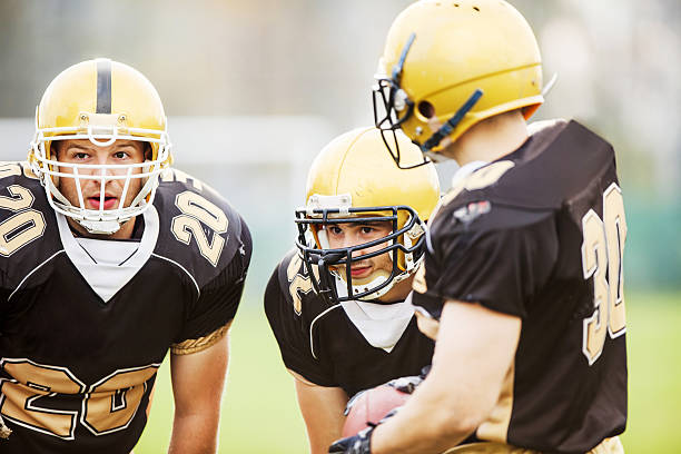 istock American football players making a plan. 467030561