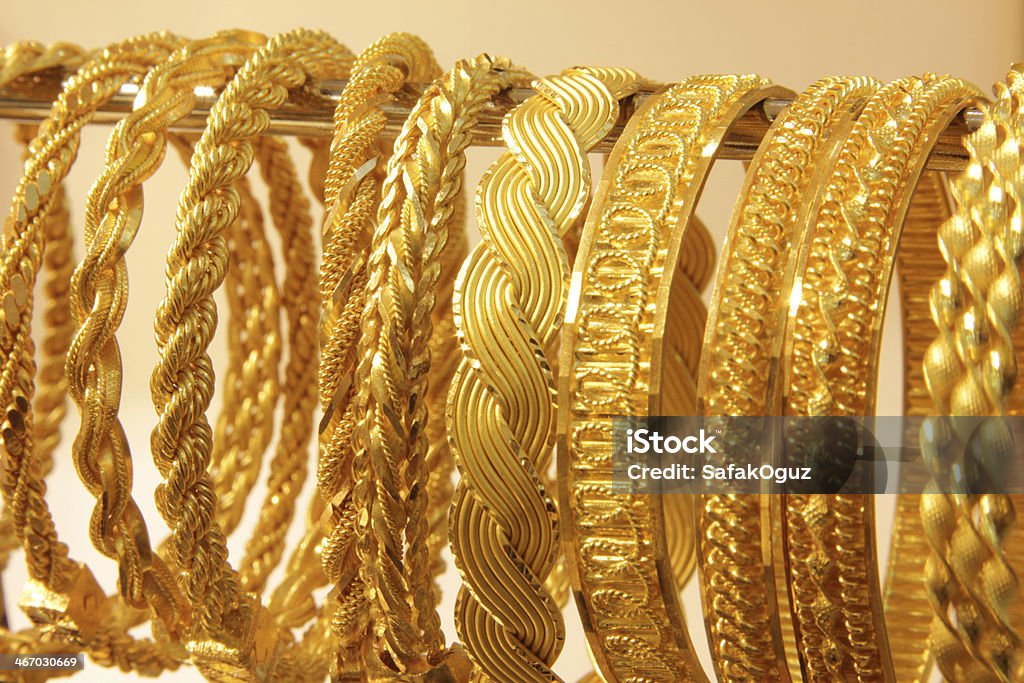 Goldene Armbänder - Lizenzfrei Accessoires Stock-Foto