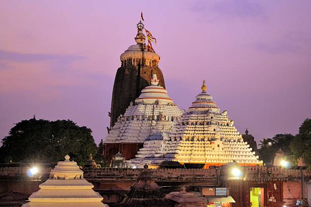 Jagannath Temple in Puri, Orissa, India Jagannath Temple in Puri, 12th Century, Orissa, India. Jagannath temple hosts the annual procession of massive chariots, juggernauts, a Hindu festival odisha stock pictures, royalty-free photos & images