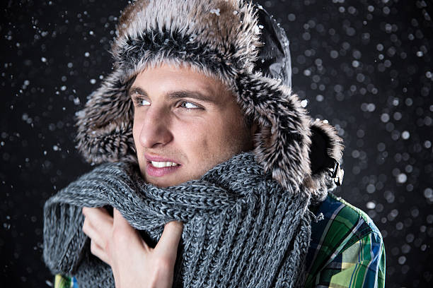 istock Handsome man in winter cloth looking away 467036236